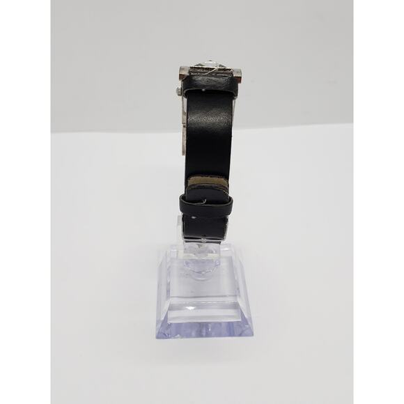 Women\'s dress watch. Silver iridescent square face. Jewels connect face to band